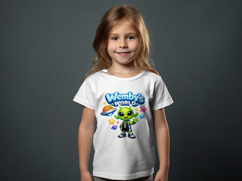White t-shirt with cartoon alien, basketball, UFO, and "Wemby's World" text.