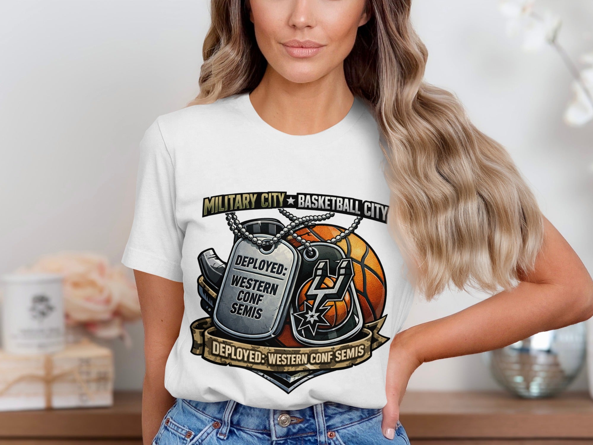 White t-shirt graphic with basketball, dog tag, and banner reading "Deployed: Western Conf Semis".
