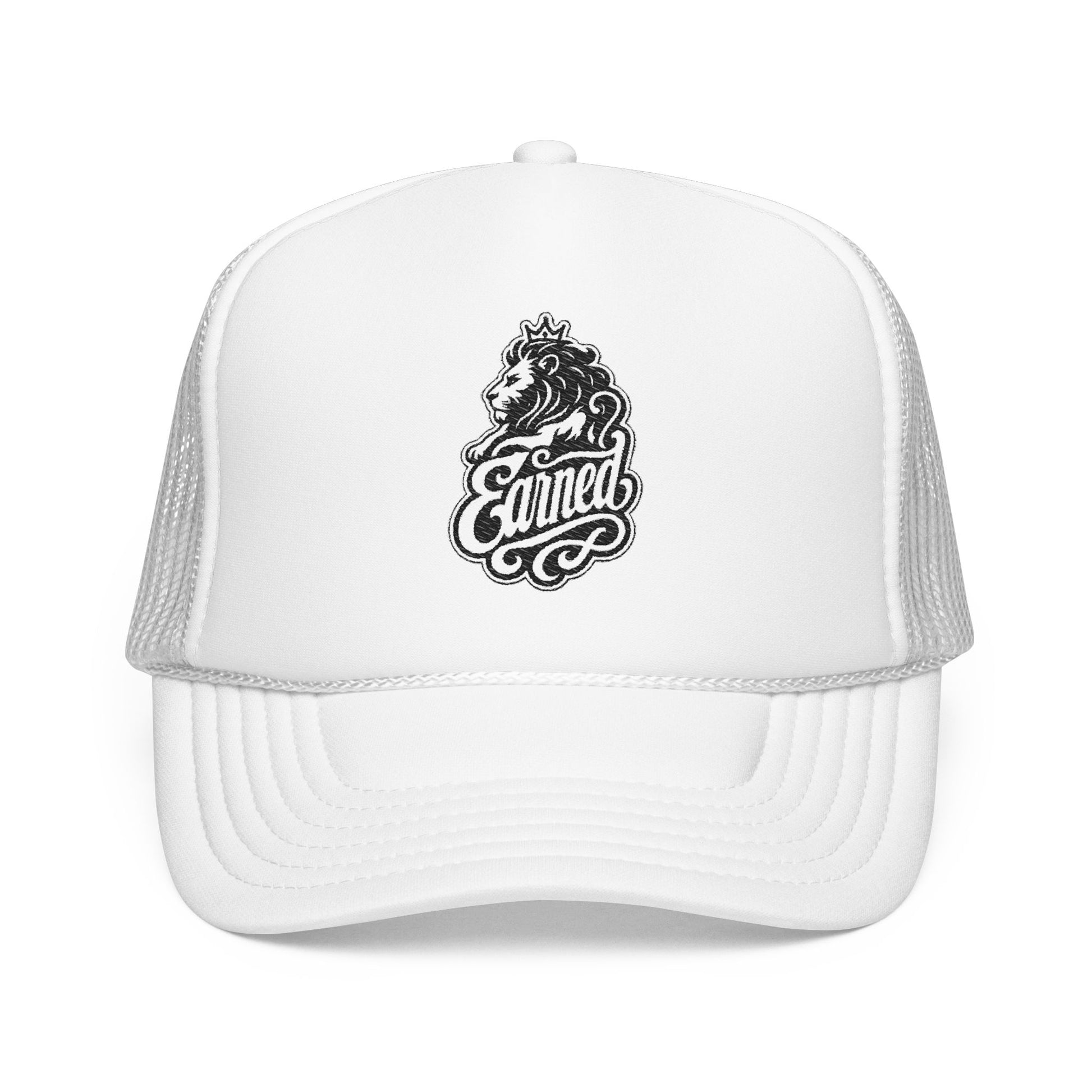 White trucker hat with a black lion wearing a crown and "Earned" text logo.
