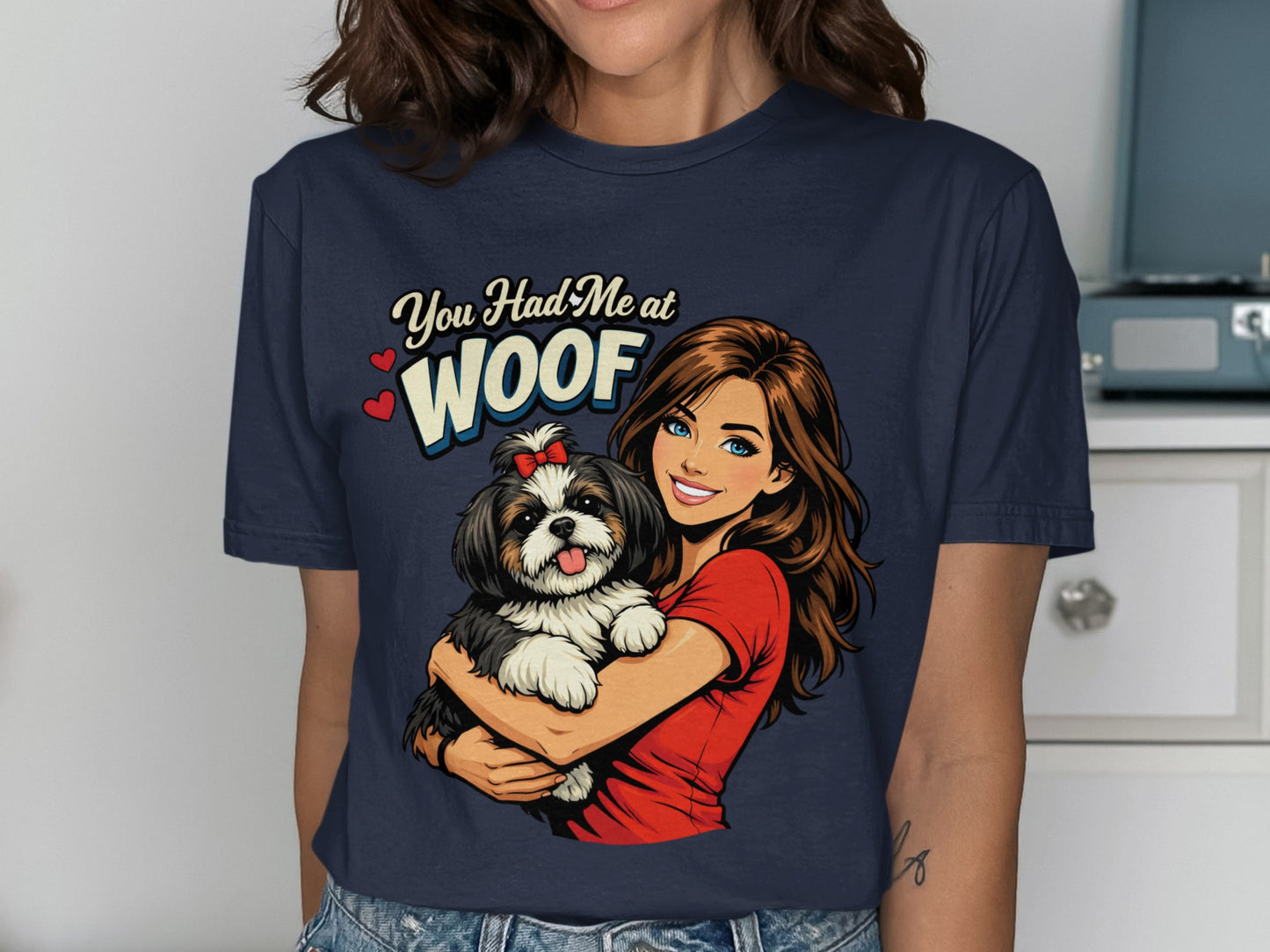 Woman holding small dog with text "You Had Me at WOOF"