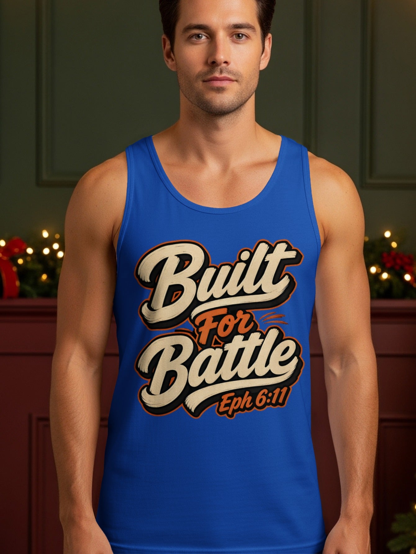 Man wearing a blue tank top with "Built For Battle Eph 6:11" text.