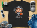 Black t-shirt with cartoon boy graphic for "Future Spurs Fan" holding basketball.