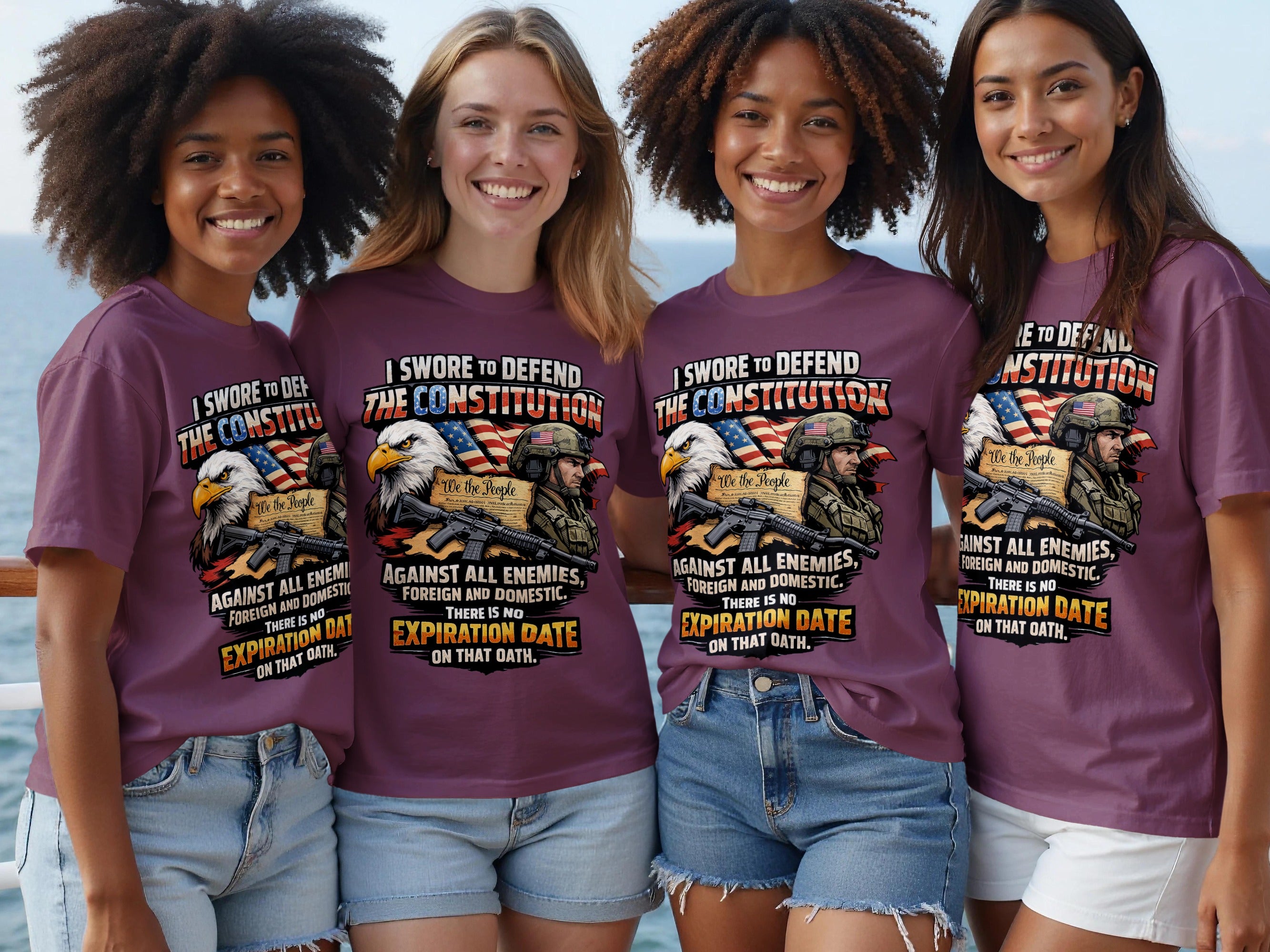 Four women wearing t-shirts with the text "I SWORE TO DEFEND THE CONSTITUTION".