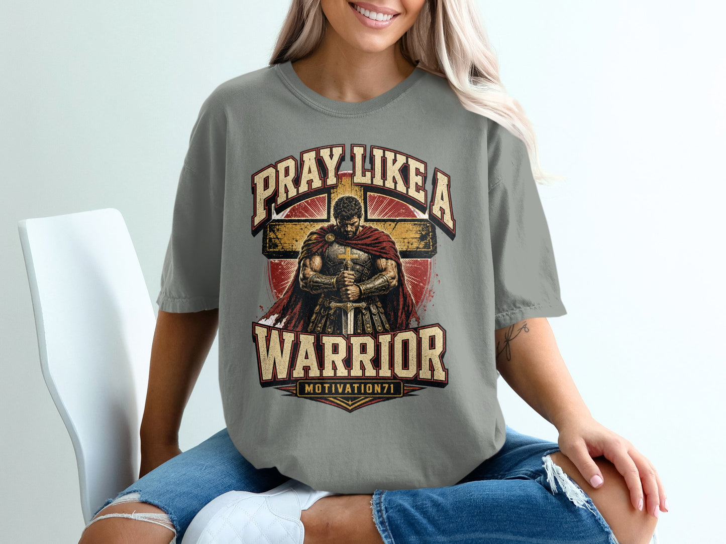 Grey t-shirt with "Pray Like a Warrior" and a depiction of a knight before a cross.