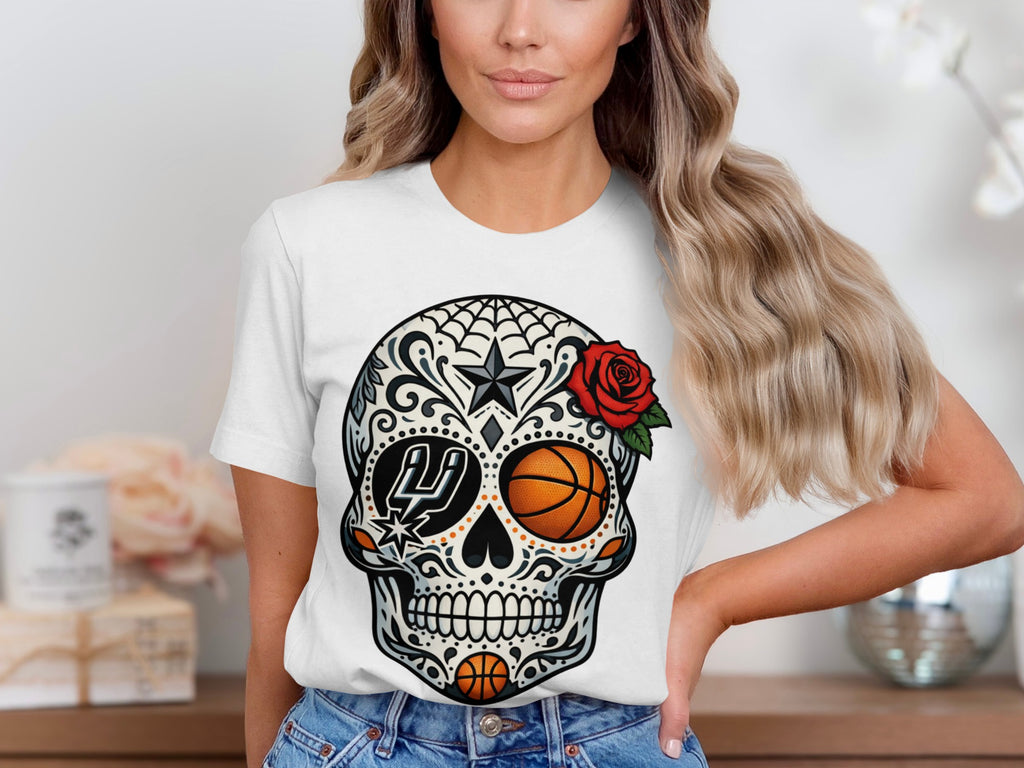 White t-shirt with a sugar skull design featuring basketballs and a Spurs logo.