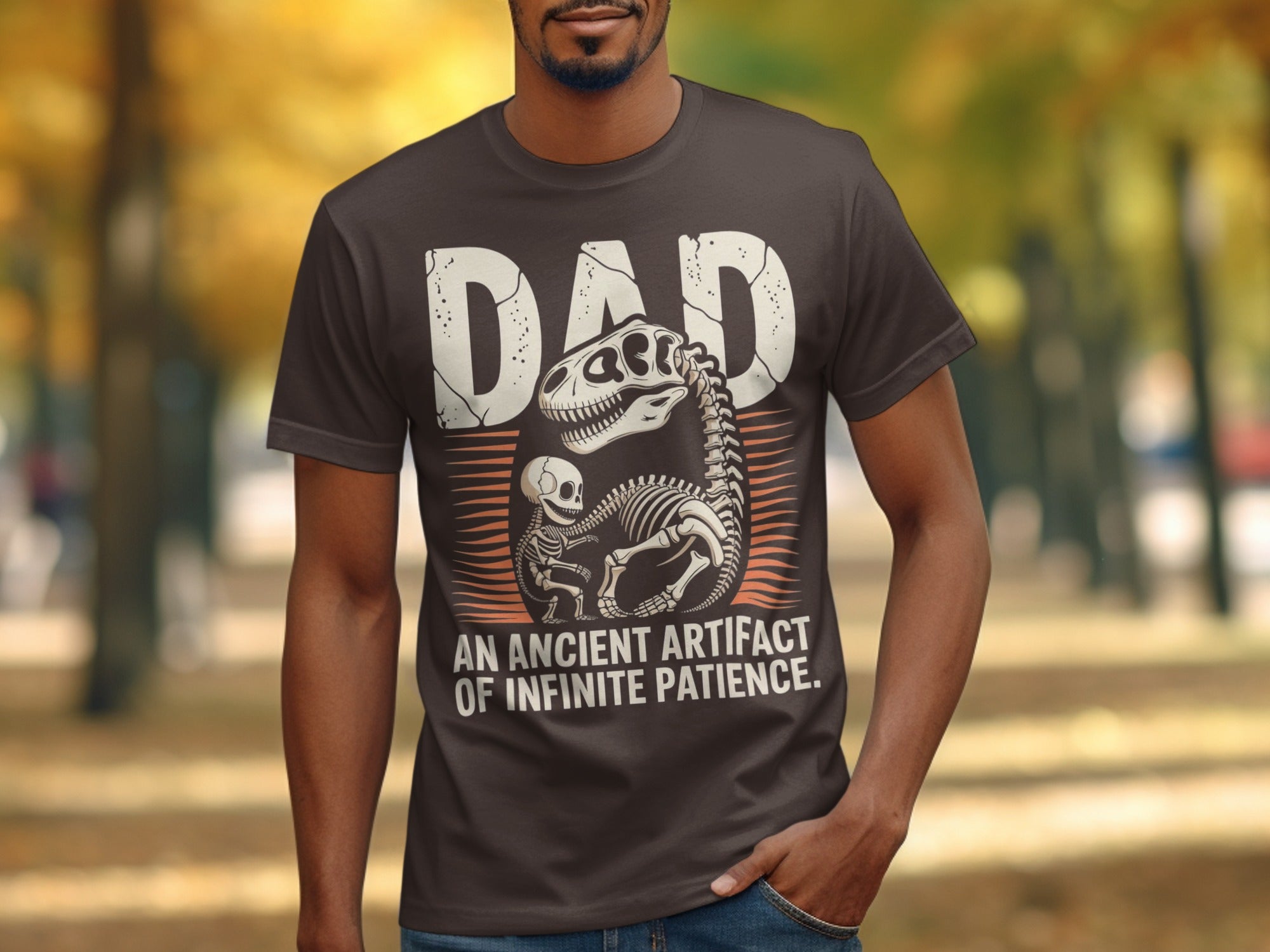 Dad t-shirt with dinosaur skeleton and text "An Ancient Artifact of Infinite Patience."