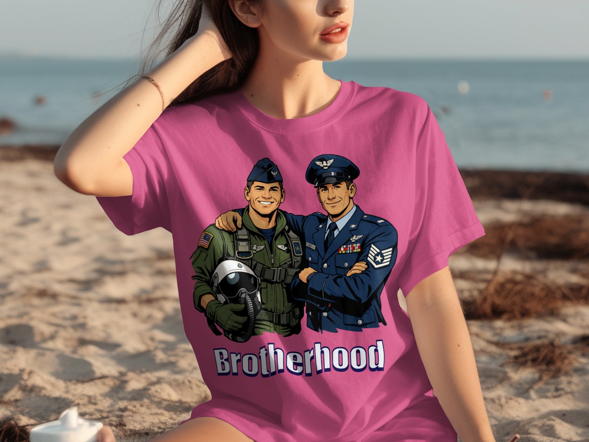 Pink t-shirt with illustration of two pilots and the text "Brotherhood."