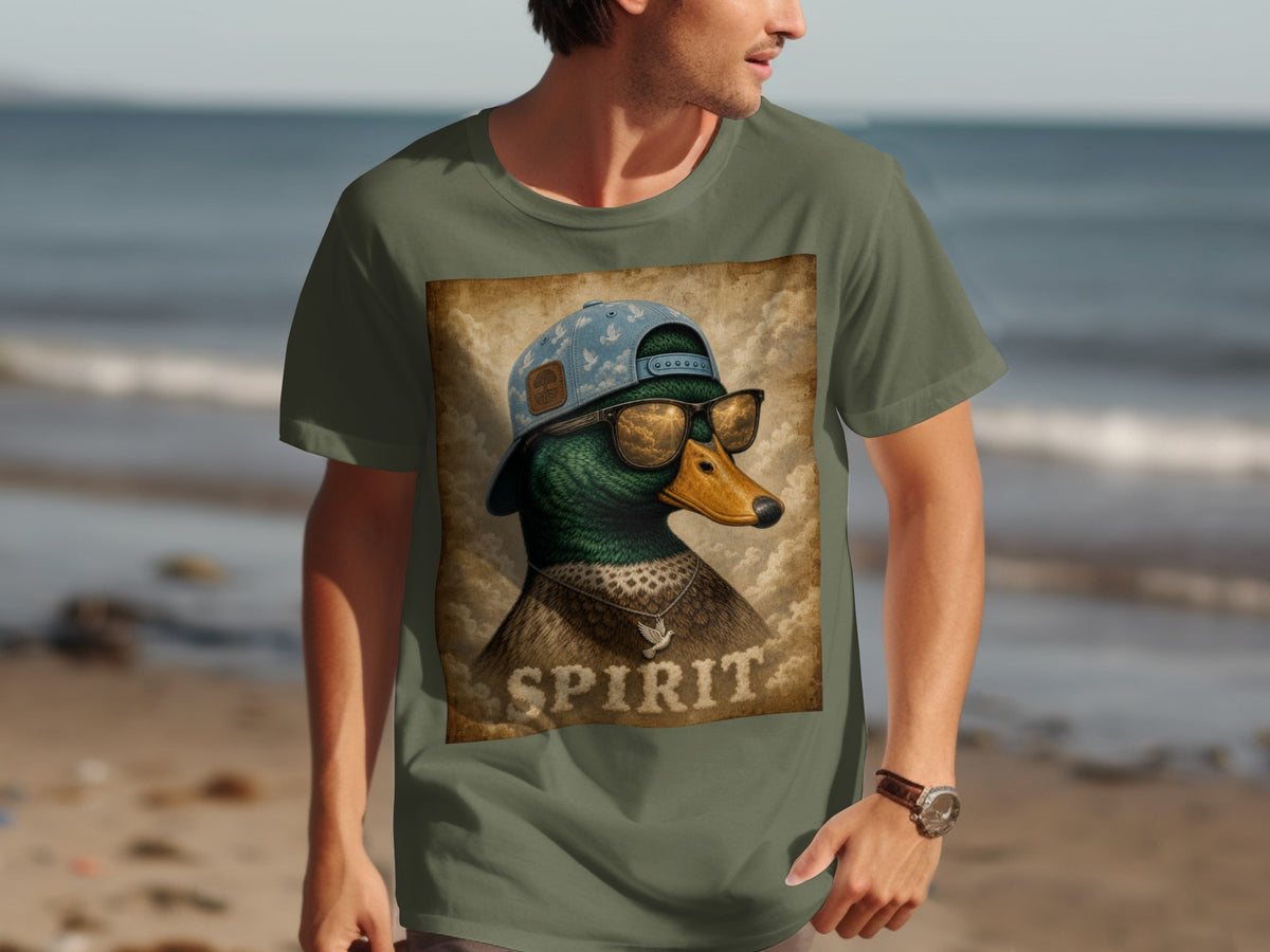 Green t-shirt with graphic of a duck wearing sunglasses, a hat, and a necklace with the word "SPIRIT" below.