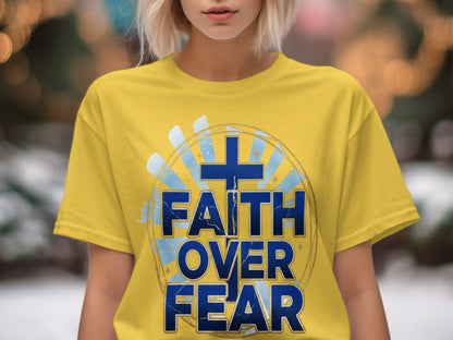 Yellow t-shirt with blue text "FAITH OVER FEAR" and a cross graphic.