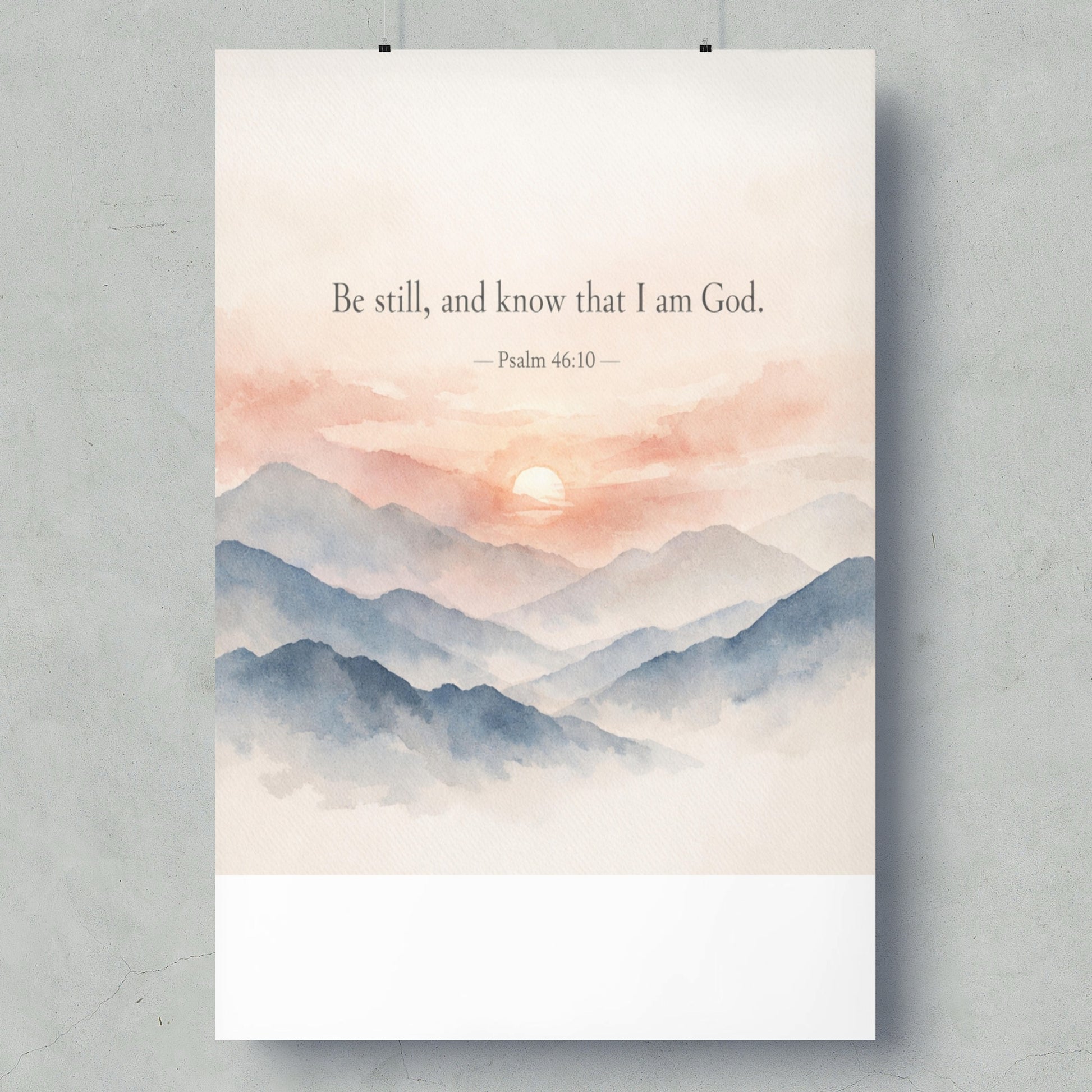 Watercolor mountains at sunset with text "Be still, and know that I am God. Psalm 46:10".