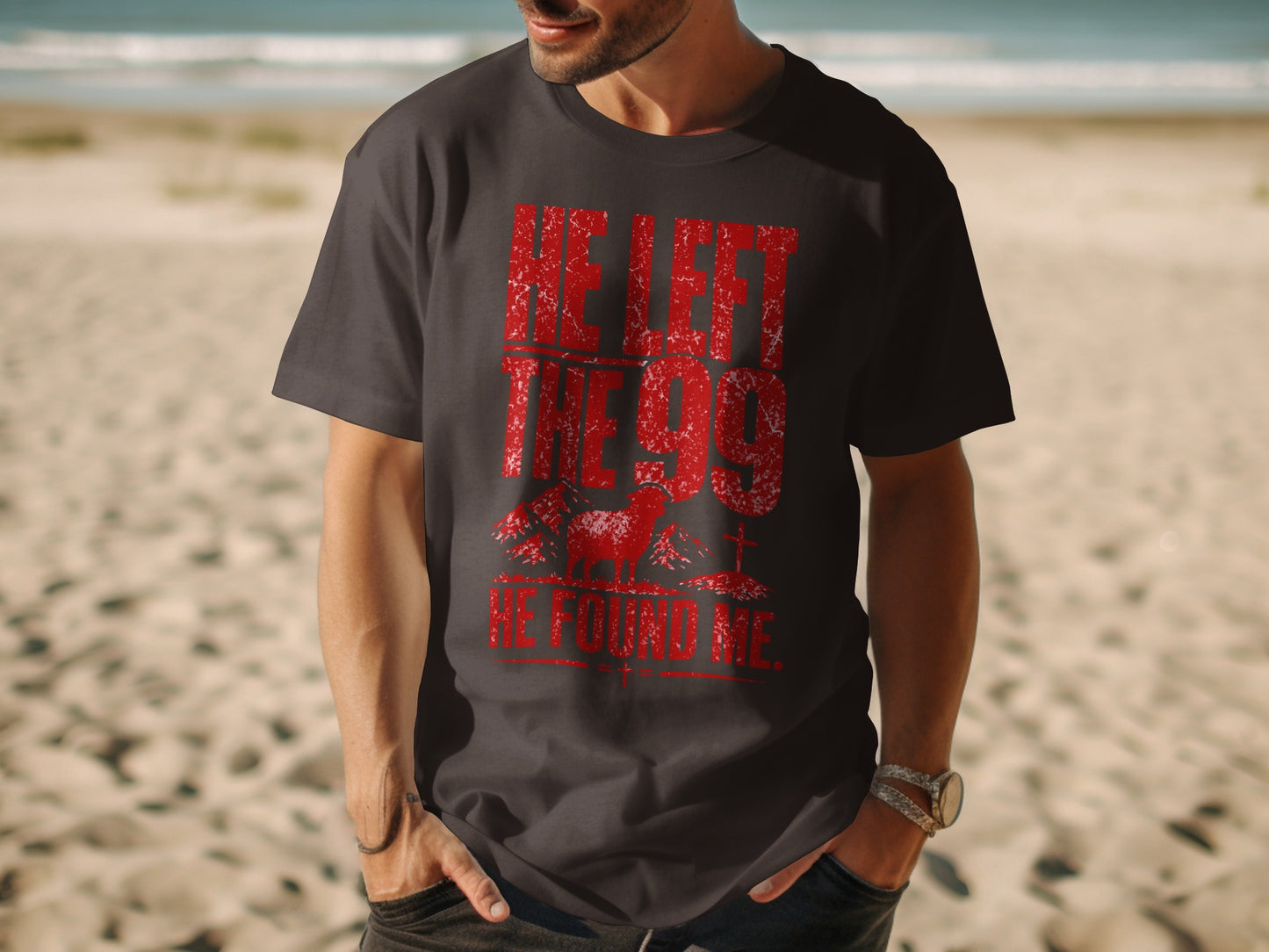 Dark t-shirt with distressed red text and sheep graphic: "He Left The 99, He Found Me."