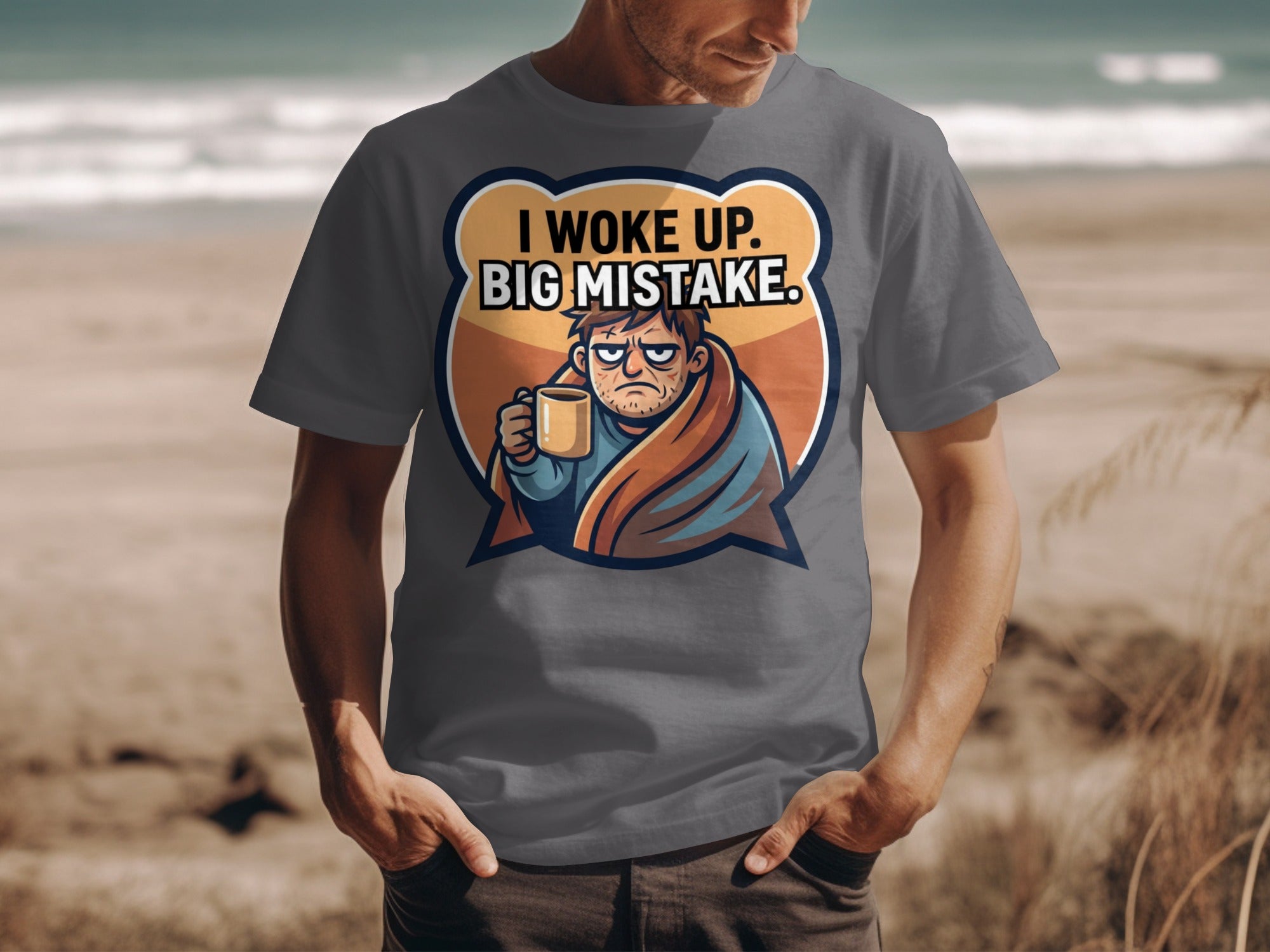 Grey t-shirt with graphic that reads "I WOKE UP. BIG MISTAKE."