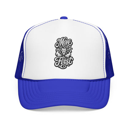 Blue and white trucker hat with embroidered lion and the words "Move First".