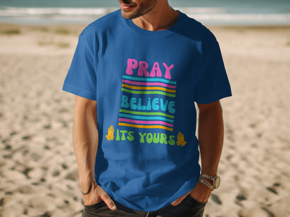 Blue t-shirt with Pray Believe Its Yours text and praying hands graphic