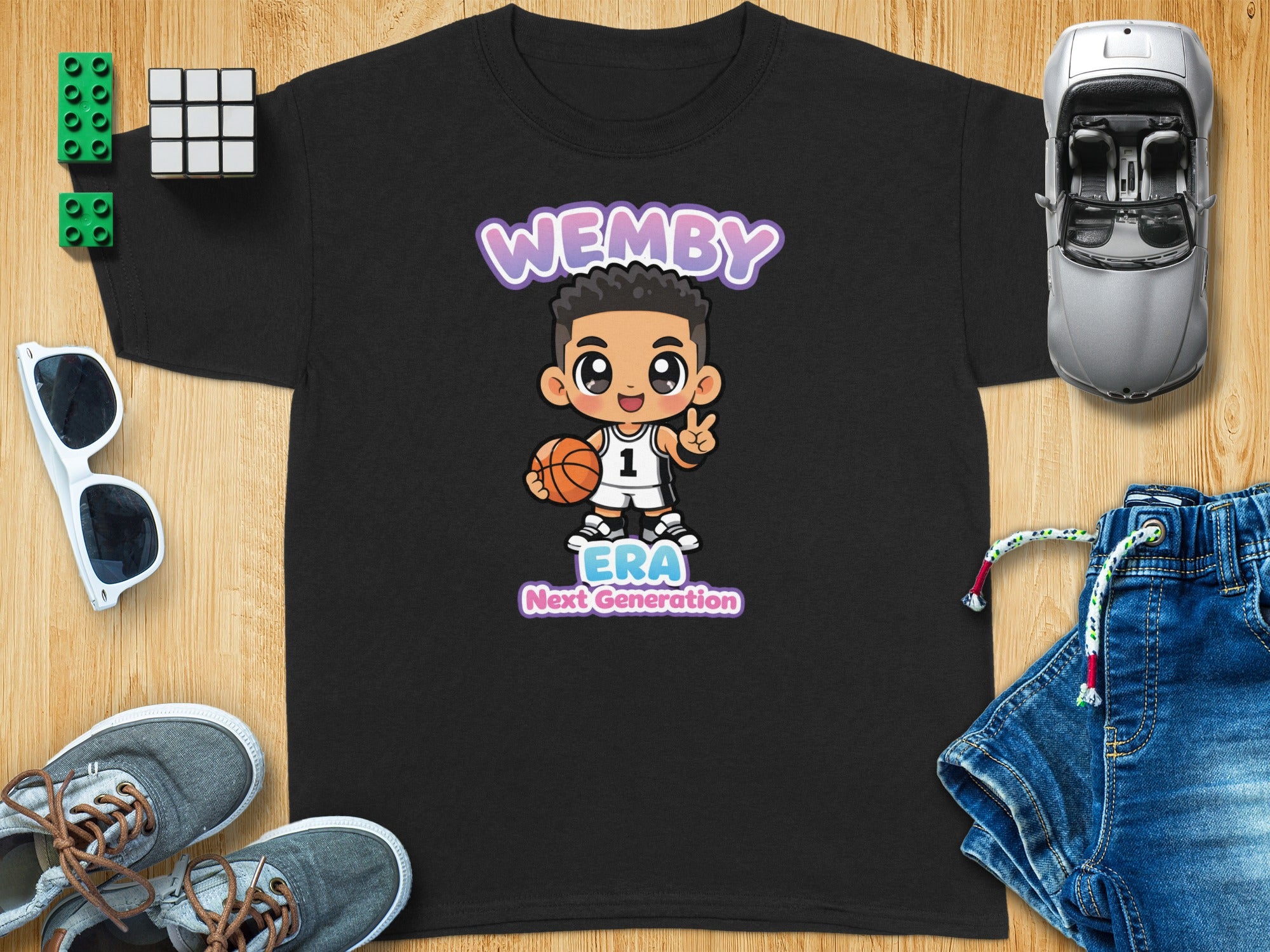 Black t-shirt with cartoon basketball player, "Wemby ERA Next Generation" text.