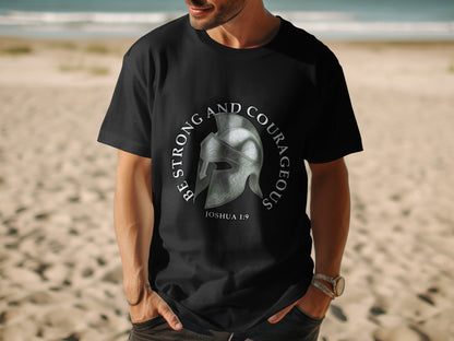Black t-shirt with a Roman helmet graphic and text "Be Strong and Courageous Joshua 1:9".