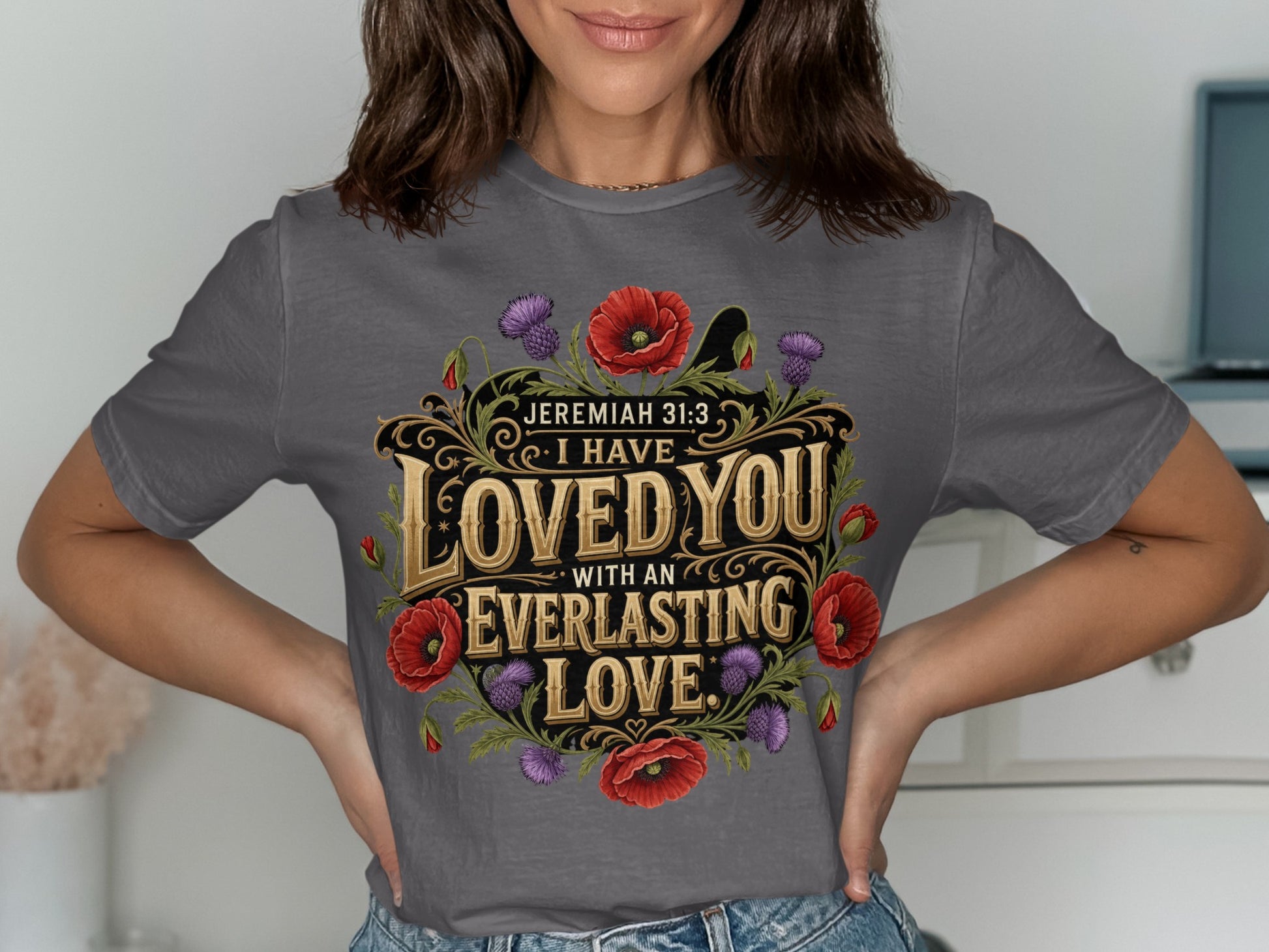 Dark grey t-shirt with text "I HAVE LOVED YOU WITH AN EVERLASTING LOVE" and flowers.