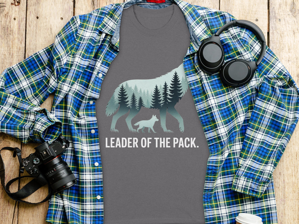 Grey t-shirt with wolf and forest silhouette, text "LEADER OF THE PACK."