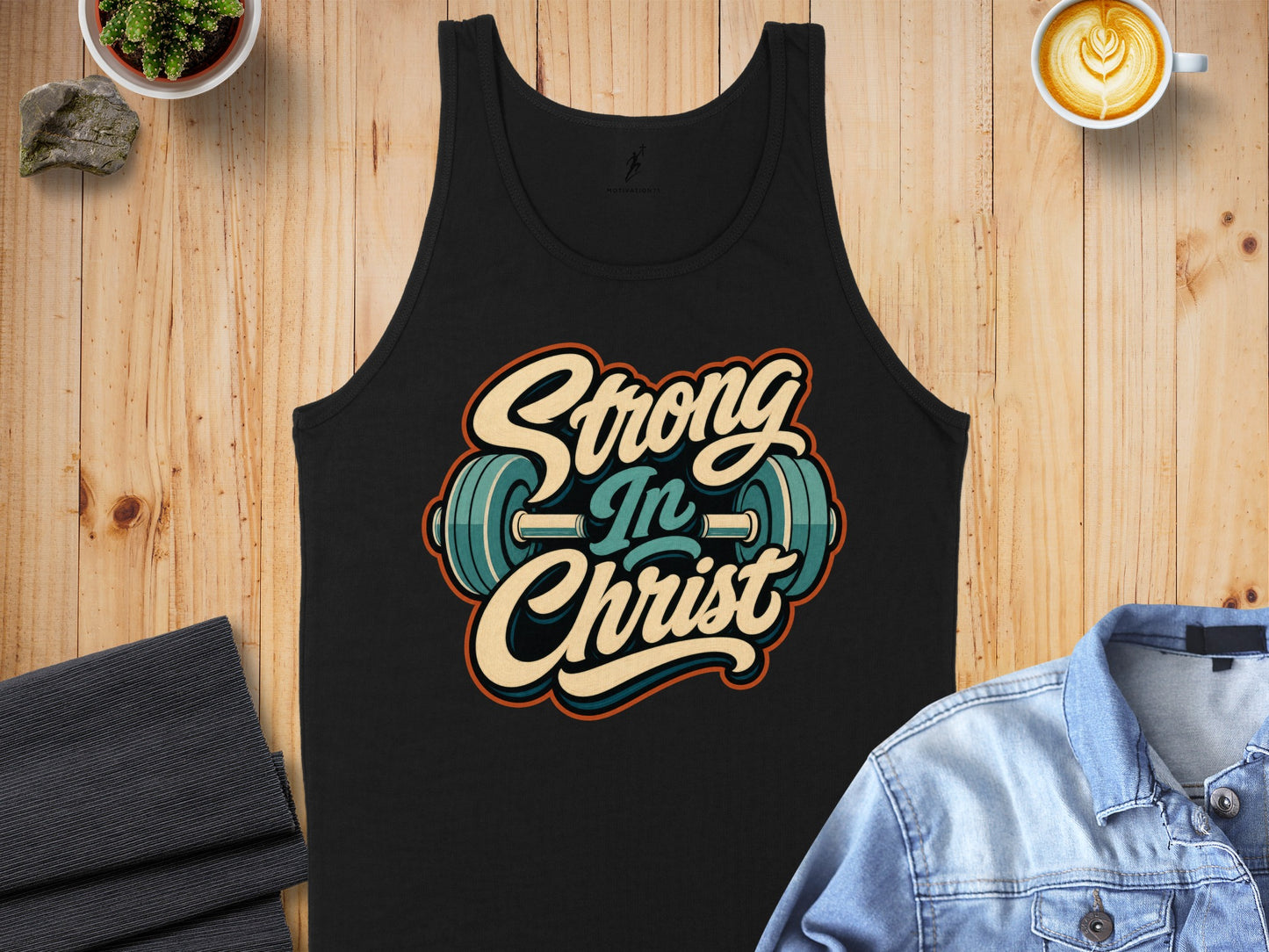 Black tank top with "Strong In Christ" text and barbell graphic