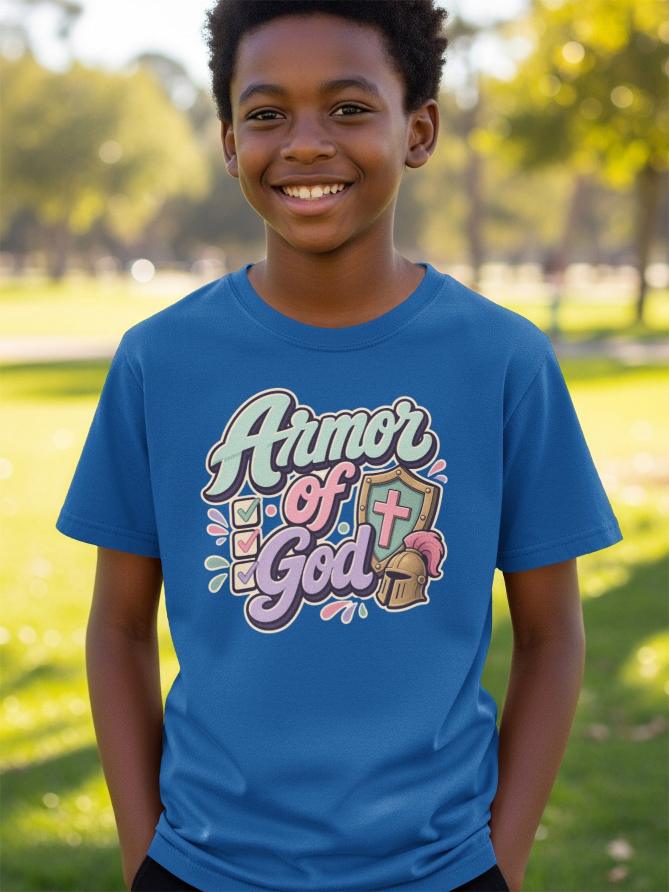 T-shirt with "Armor of God" text, shield, cross, and helmet graphic.