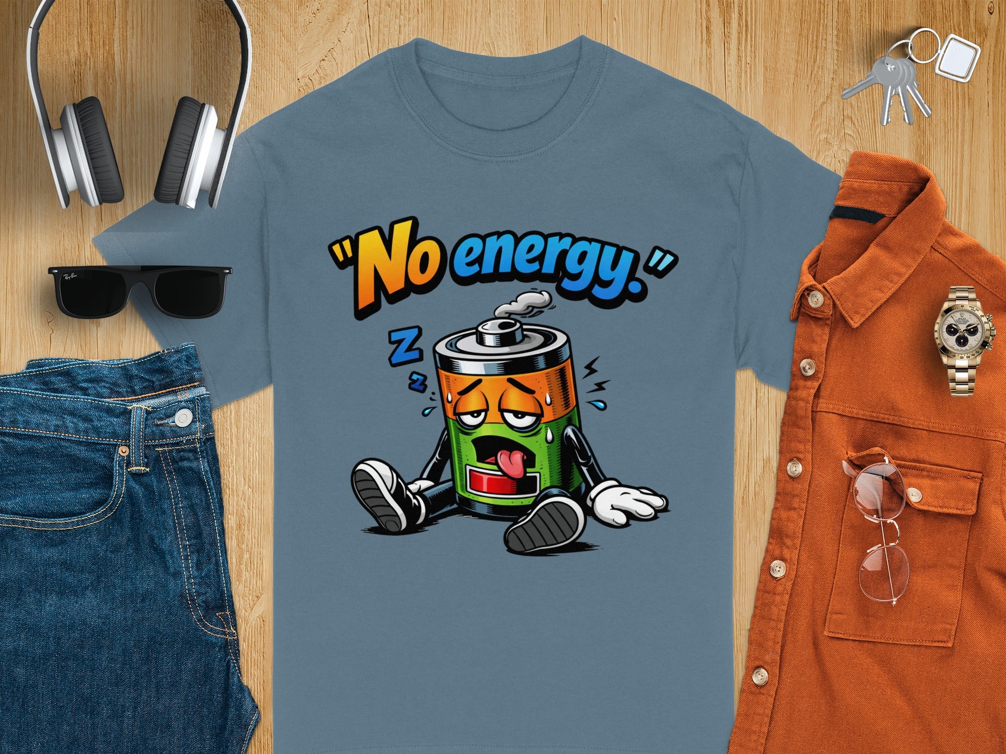 Blue t-shirt with tired battery character and text "No energy."