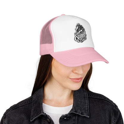Pink and white mesh trucker hat with black lion and "Earned" text logo.
