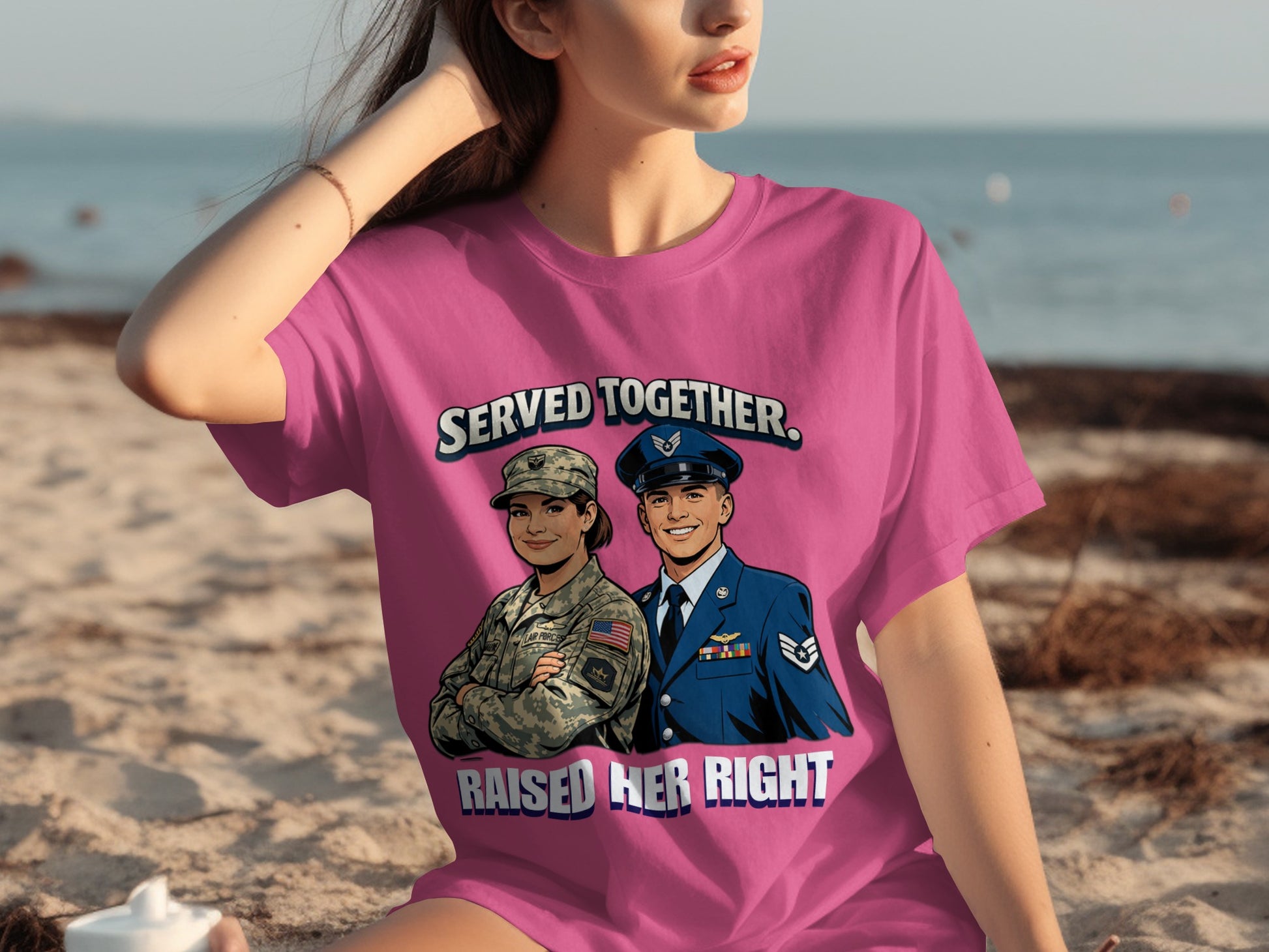 Pink t-shirt with military couple graphic reading "Served Together. Raised Her Right."