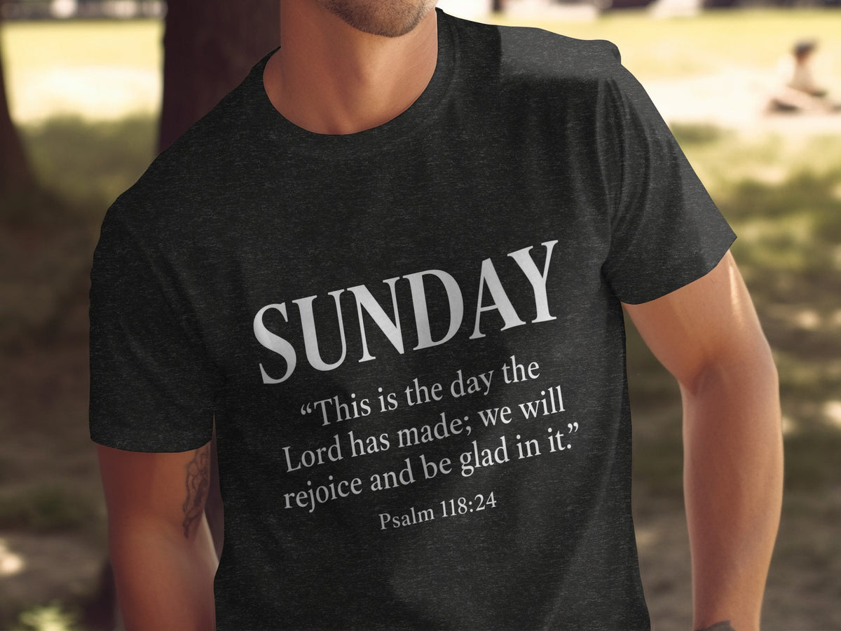 Dark t-shirt with white text "SUNDAY" and Psalm 118:24 quote.
