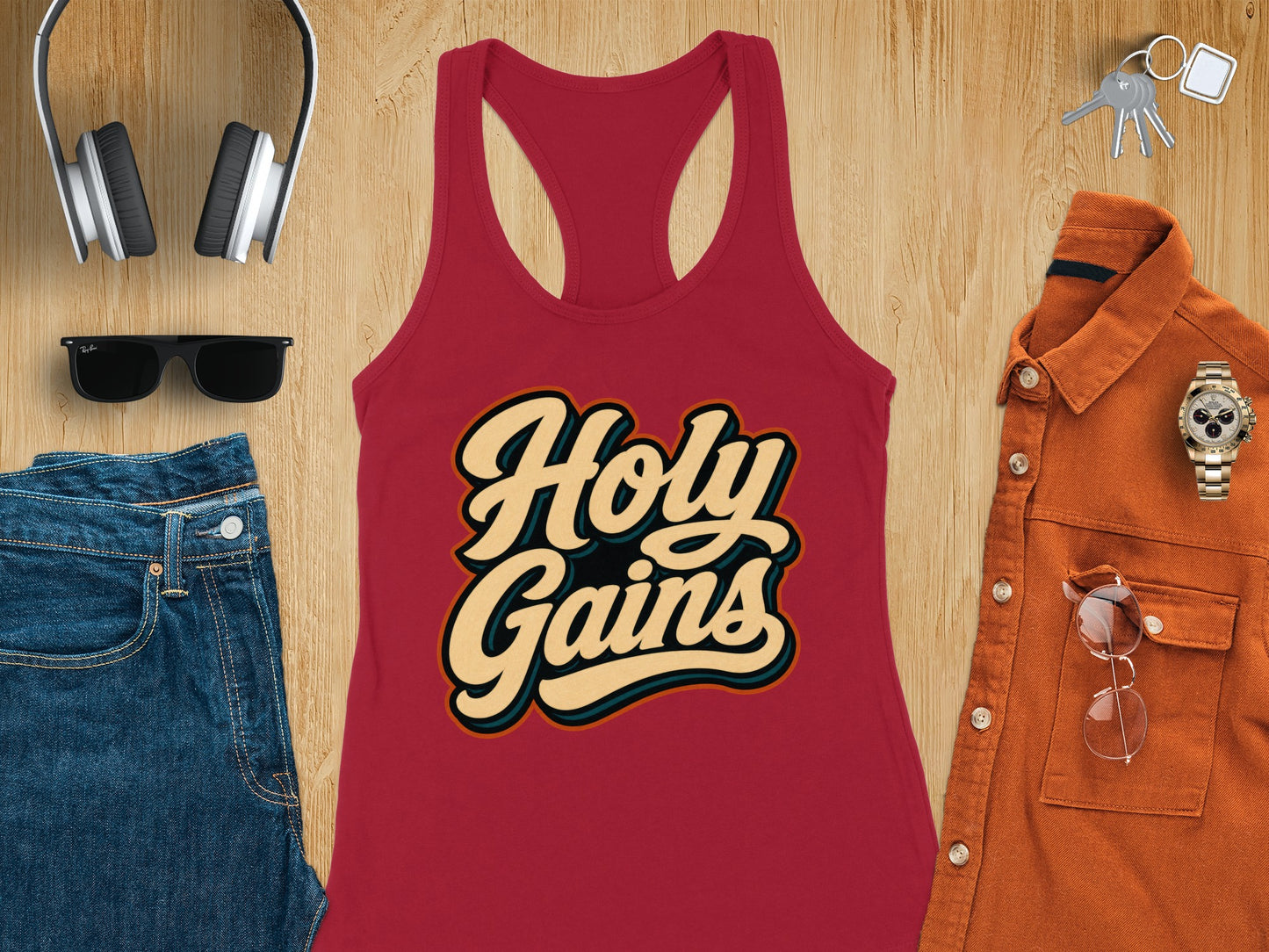 Red tank top with "Holy Gains" text and accompanying outfit items.