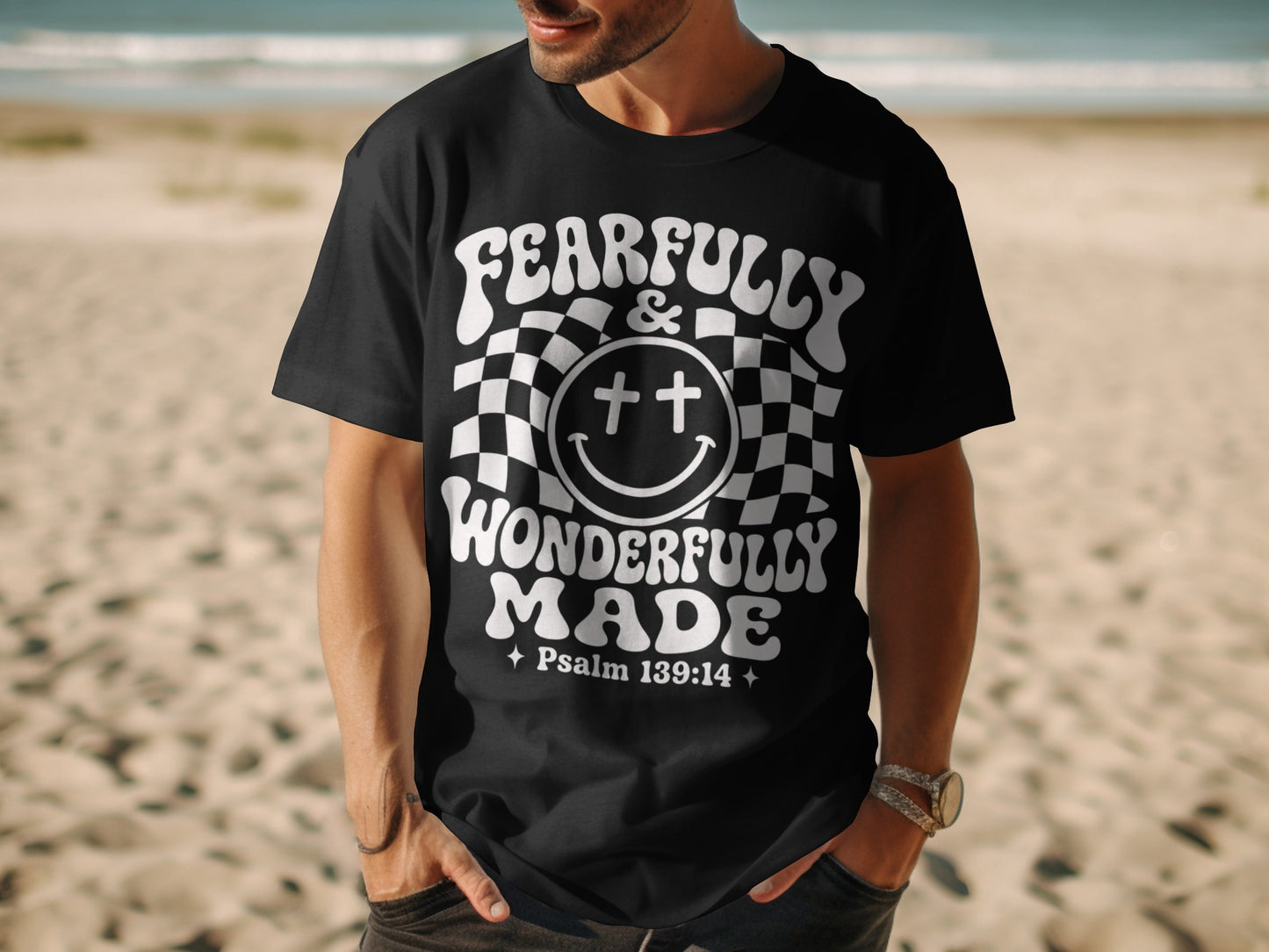 Black t-shirt with "Fearfully & Wonderfully Made Psalm 139:14" text and smiley face.