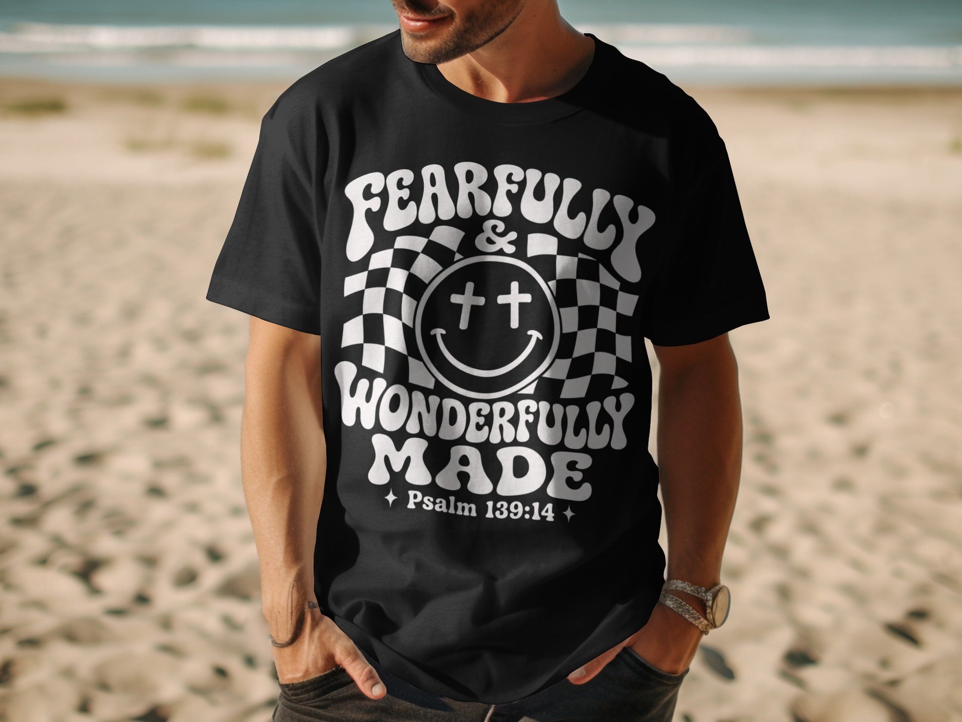 Black t-shirt with "Fearfully & Wonderfully Made Psalm 139:14" text and smiley face.