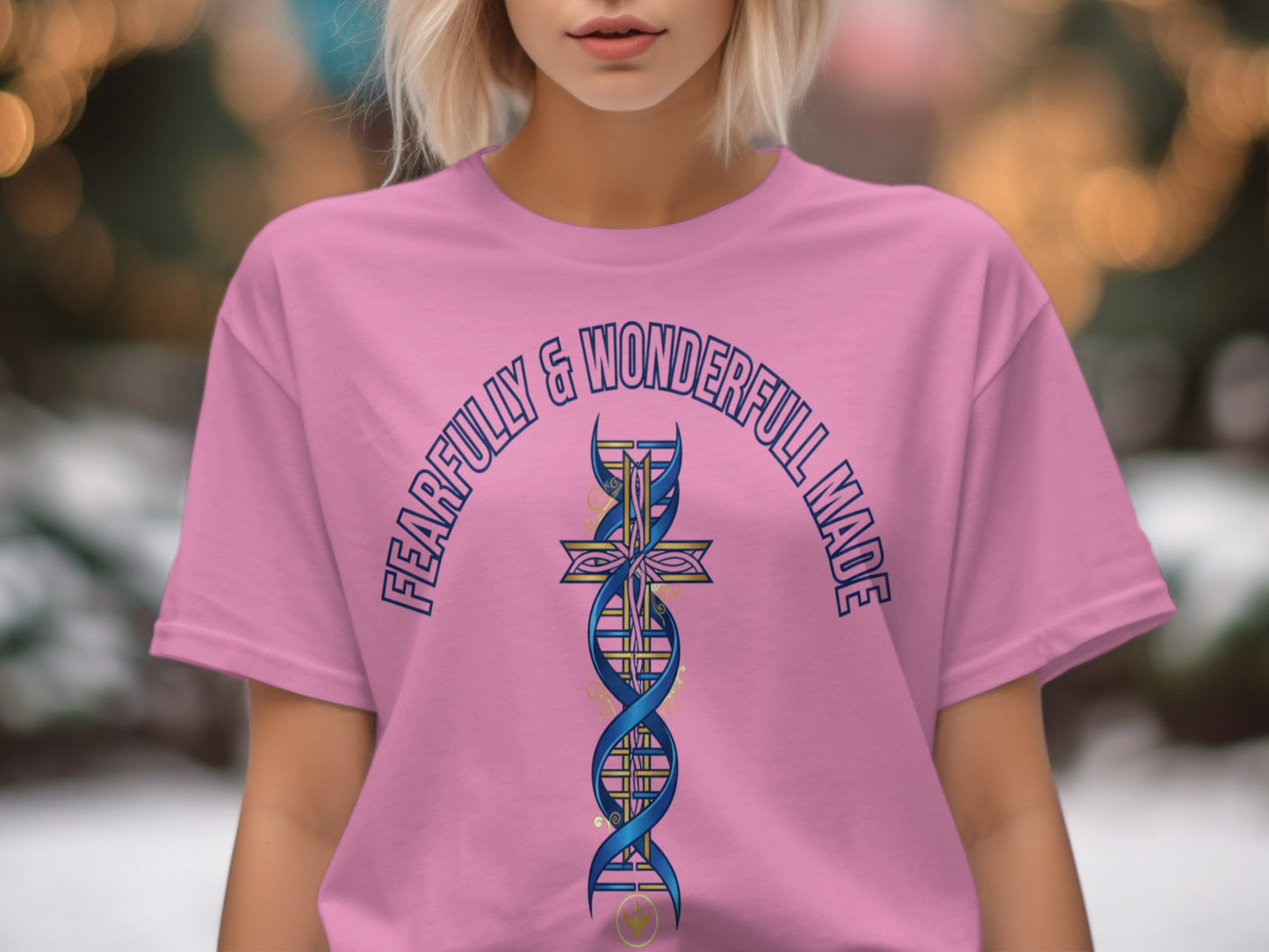Pink t-shirt with "FEARFULLY & WONDERFULL MADE" text and a cross with DNA strand.
