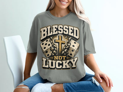 Grey t-shirt with "Blessed Not Lucky" text, dice, and cross graphic.