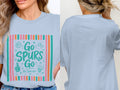 Light blue t-shirt with "Go Spurs Go! Go Spurs Go!" and basketball graphics.