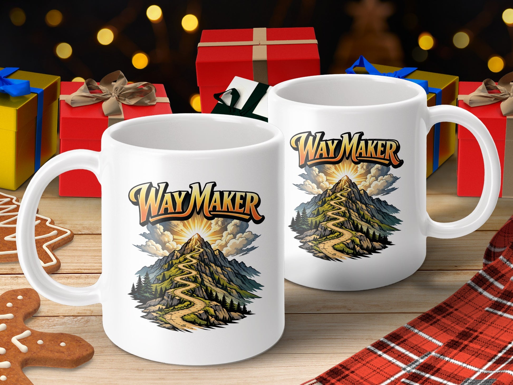 Two white mugs display the text "Way Maker" above a winding mountain path artwork.