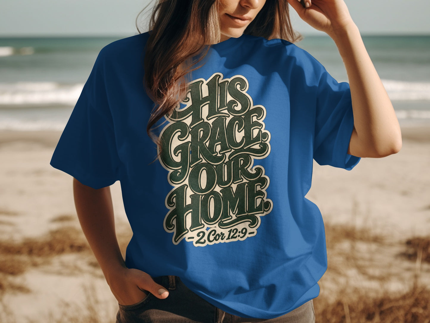 Blue t-shirt with "His Grace Our Home" text and Bible verse 2 Cor 12:9.