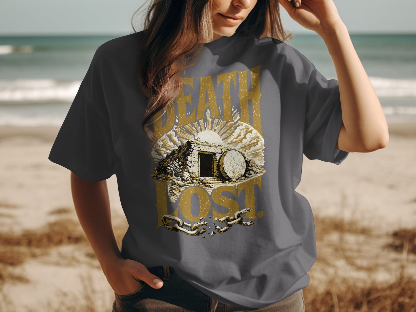 T-shirt graphic with tomb, sun, and broken chains, text reads "DEATH LOST".