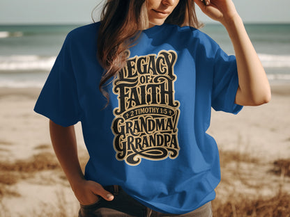 Blue t-shirt with "Legacy of Faith, Grandma, Grandpa" text and scripture reference.