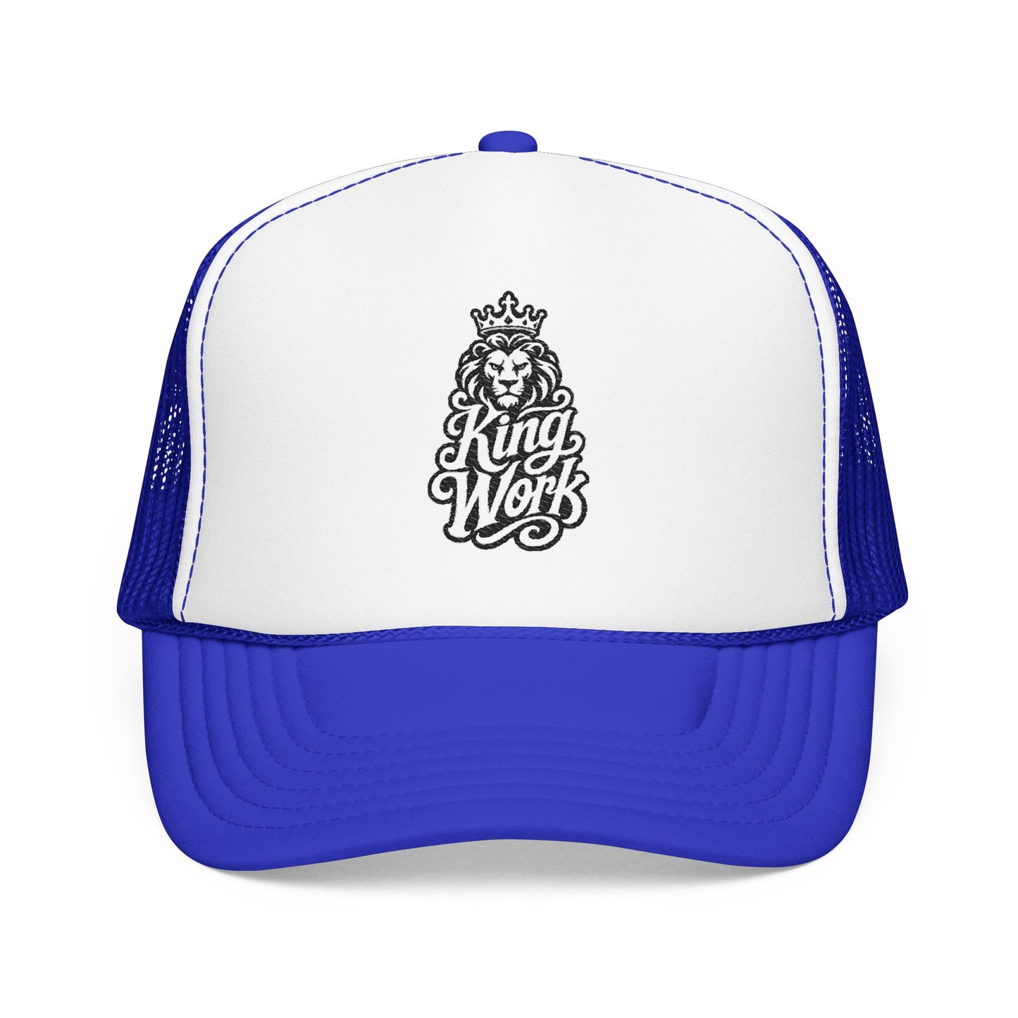 Royal blue and white trucker hat with black lion and crown graphic.