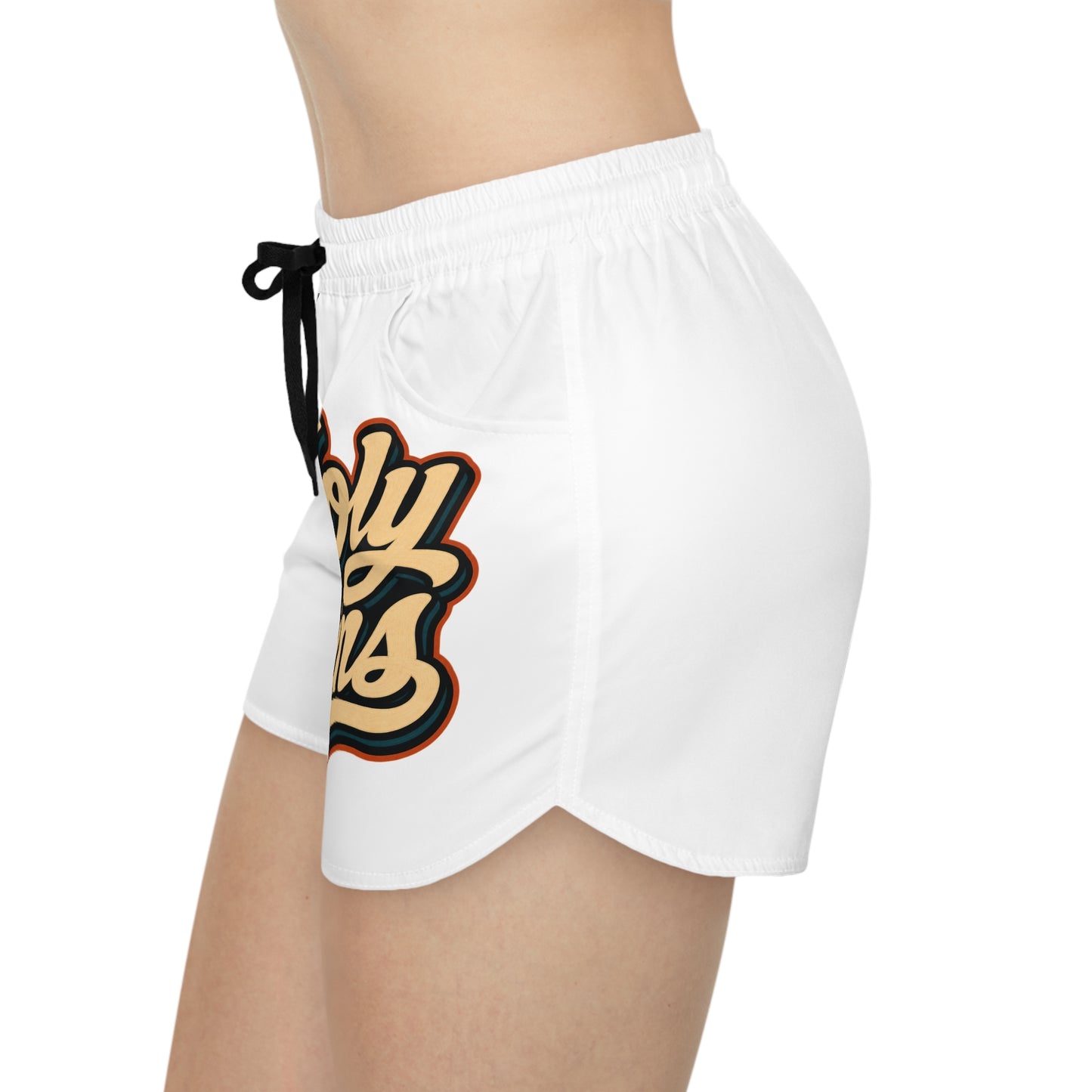 White shorts with drawstring and retro "Holy Vibes" graphic.