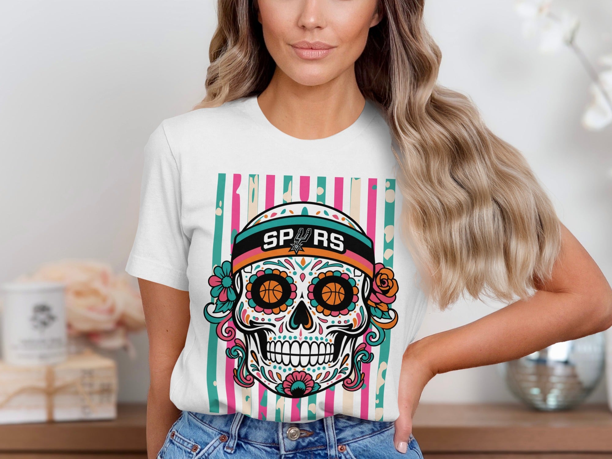 T-shirt with San Antonio Spurs sugar skull graphic and colorful striped background.