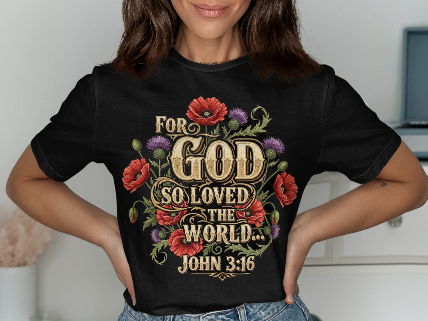 Black t-shirt with "For God So Loved The World... John 3:16" and floral design.