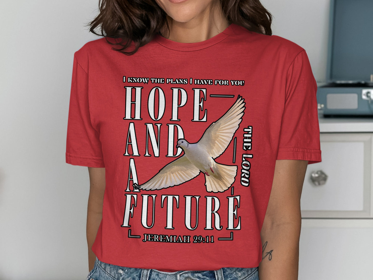 Red t-shirt with "Hope and a Future" and Jeremiah 29:11 text and a dove.