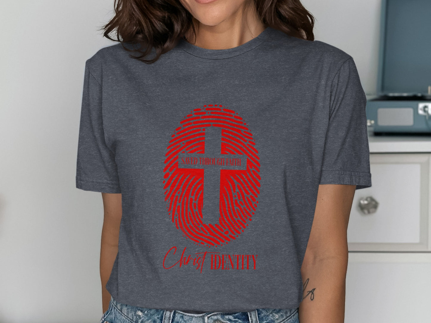 Dark gray t-shirt with red fingerprint cross graphic and "Christ Identity" text.