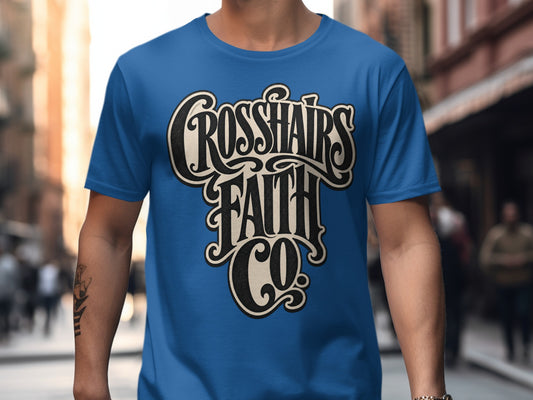 Blue t-shirt with "Crosshairs Faith Co." text in stylized font.