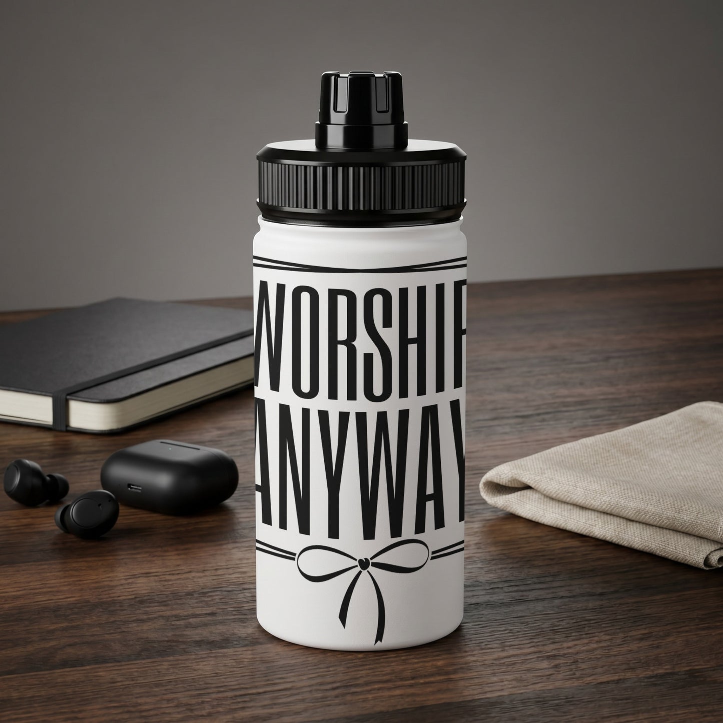 White water bottle with black text "WORSHIP ANYWAY" and a ribbon graphic.