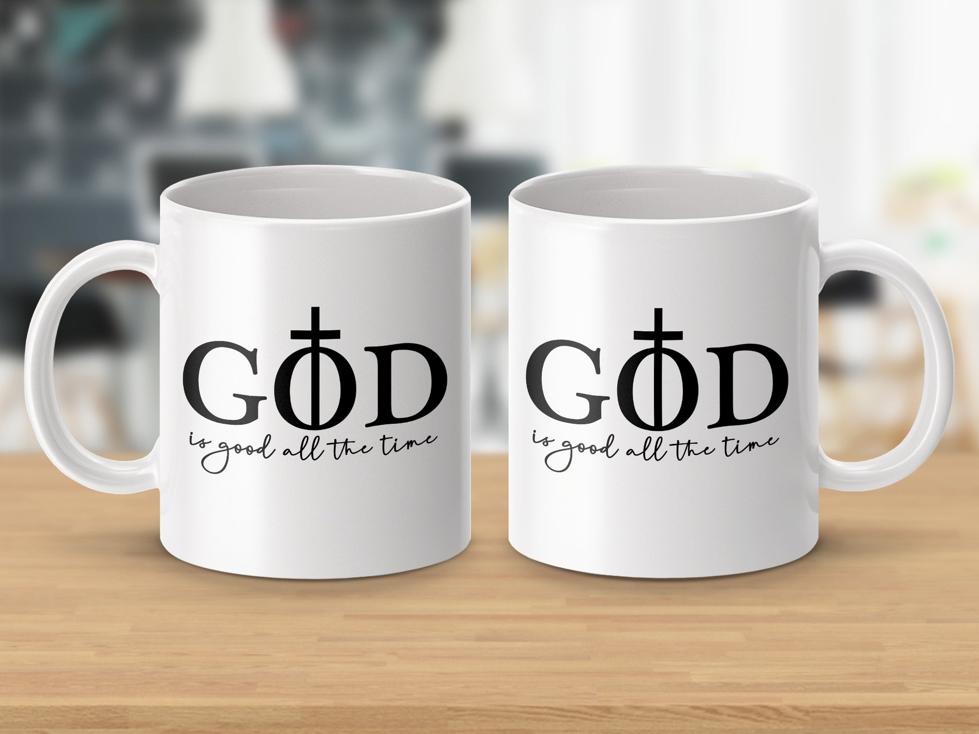 Two white mugs with black text: "GOD is good all the time."