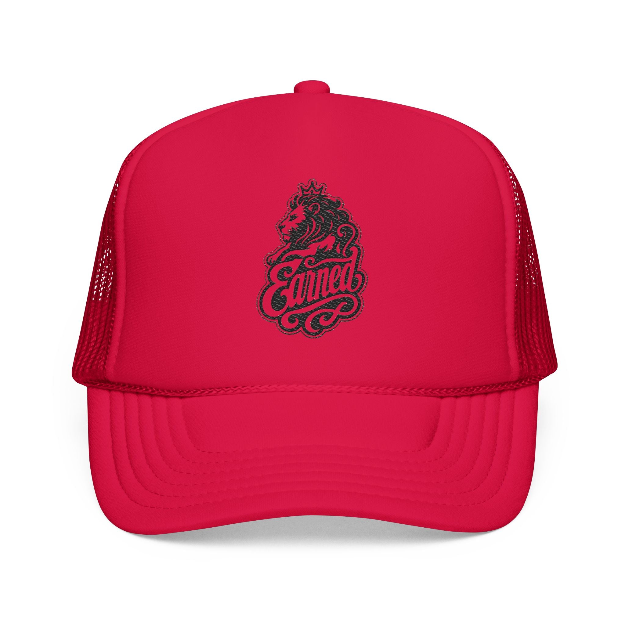 Red trucker hat with a lion wearing a crown and the word "Earned".