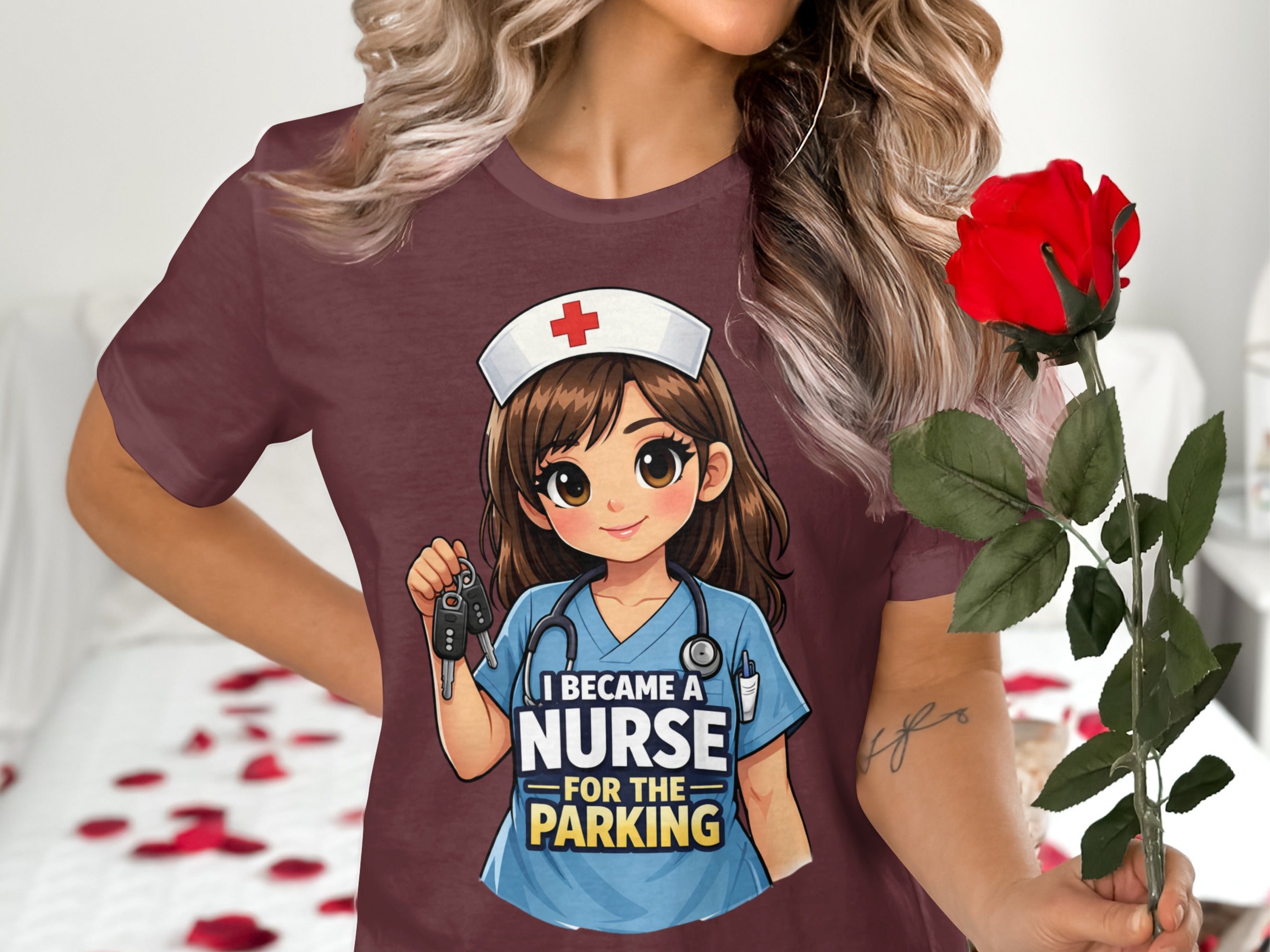 Maroon t-shirt with a cartoon nurse graphic saying "I Became a Nurse for the Parking."