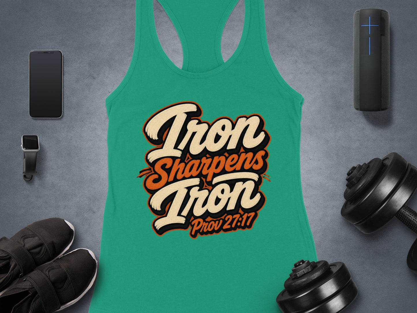 Teal tank top with "Iron Sharpens Iron Prov 27:17" text and workout accessories